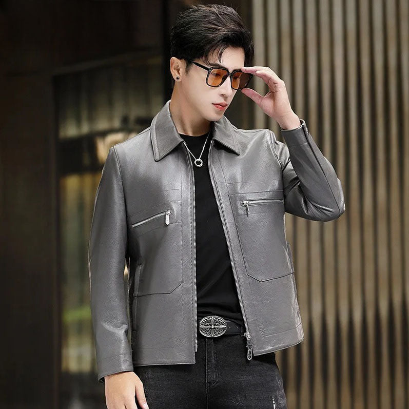 Model wearing Mercury sheepskin jacket, adjusting glasses; clean front design and vertical zipper visible — From Borcelleclothes.