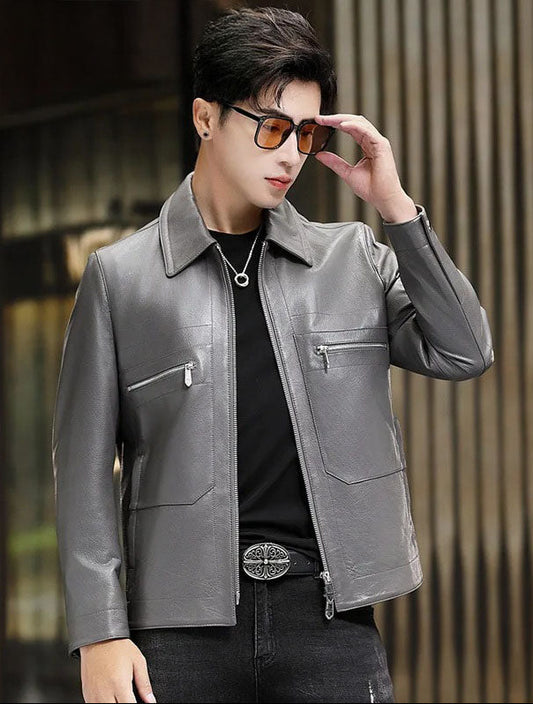Model wearing Mercury sheepskin jacket, adjusting glasses; clean front design and vertical zipper visible — From Borcelleclothes.