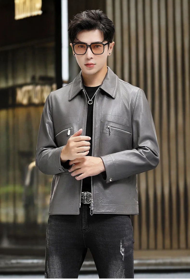 Detail of snap cuff on Mercury leather jacket, with model’s hand adjusting sleeve — From Borcelleclothes.