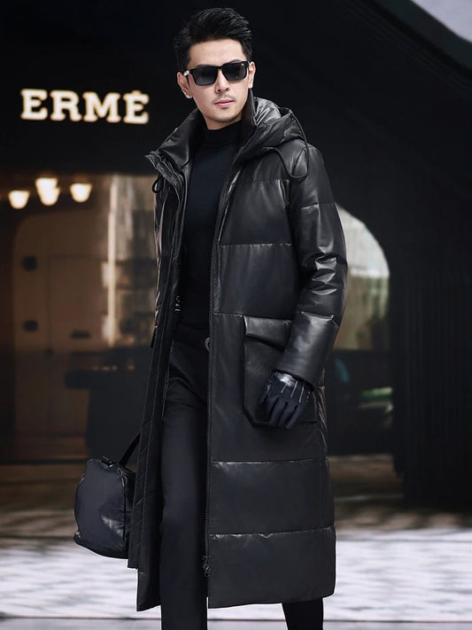 Model in mid-calf cowhide down coat in Onyx walking forward; the coat’s weight and length hold firm in motion — From Borcelleclothes.