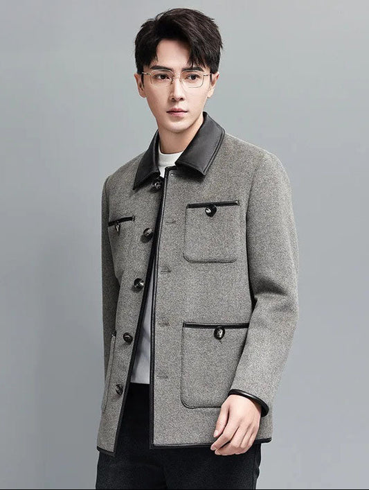 Concord color men’s minimalist motif wool-cashmere coat, model turned slightly to the side — From Borcelleclothes.