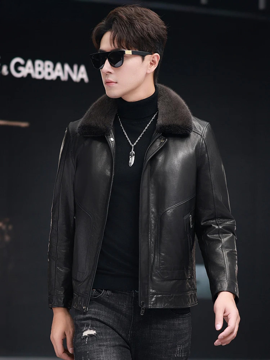 Man walking forward and looking sideways in goatskin jacket with mink collar — From Borcelleclothes.