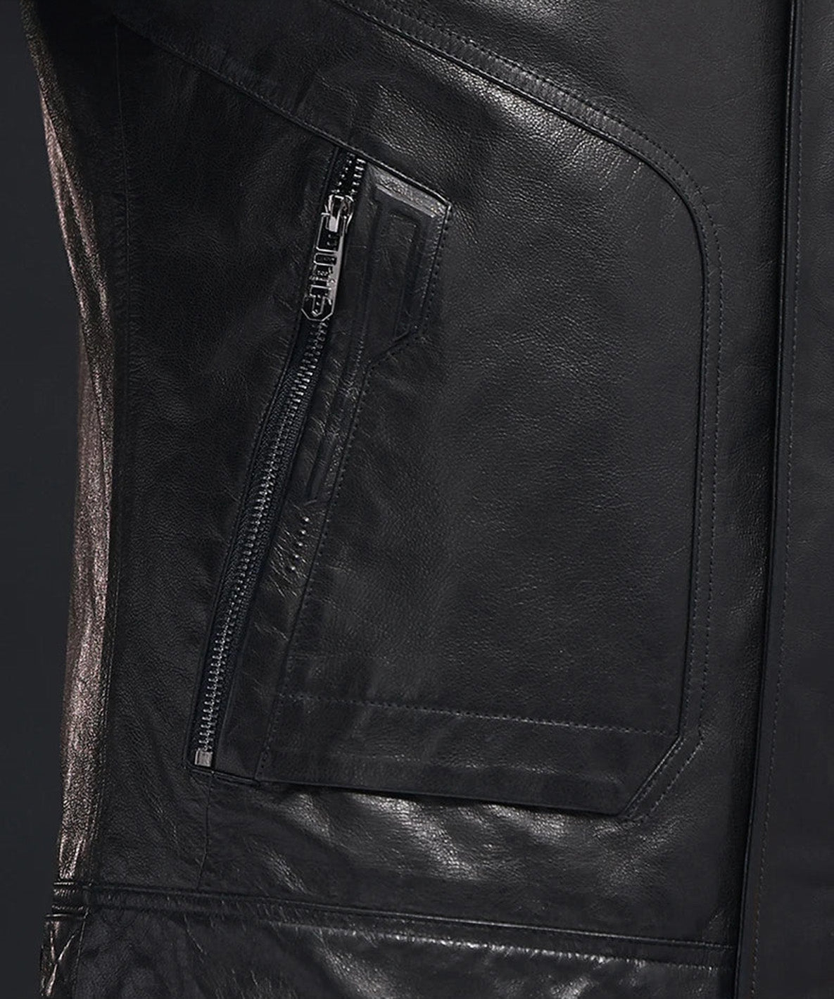 Side pocket detail of goatskin jacket in Onyx with subtle structure — From Borcelleclothes.