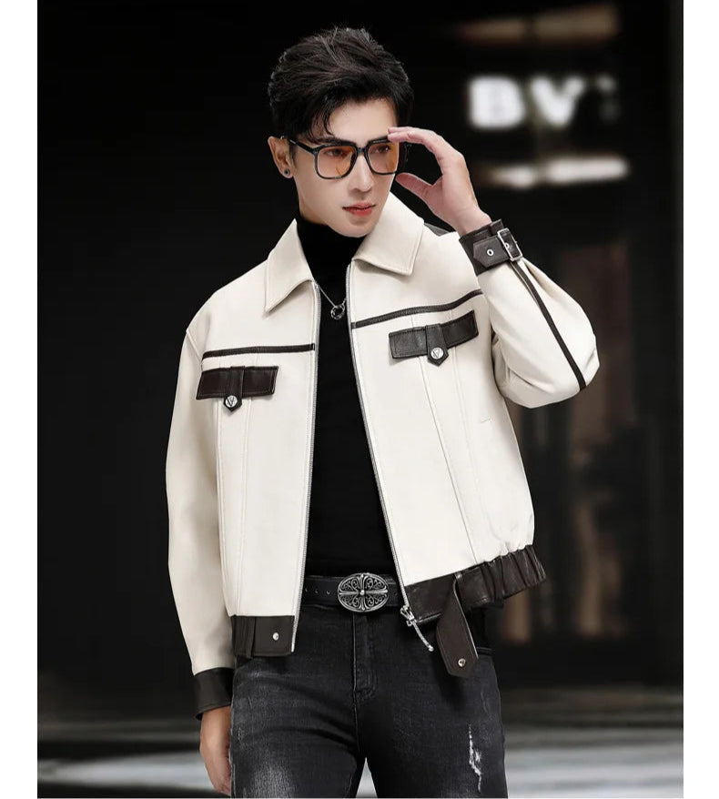 Model adjusting glasses while wearing men’s Moto DNA sheepskin jacket in Alabaster Oil — From Borcelleclothes.