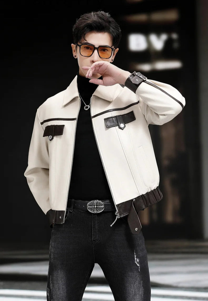 Model touching lips while wearing Moto DNA sheepskin jacket in Alabaster Oil — From Borcelleclothes.