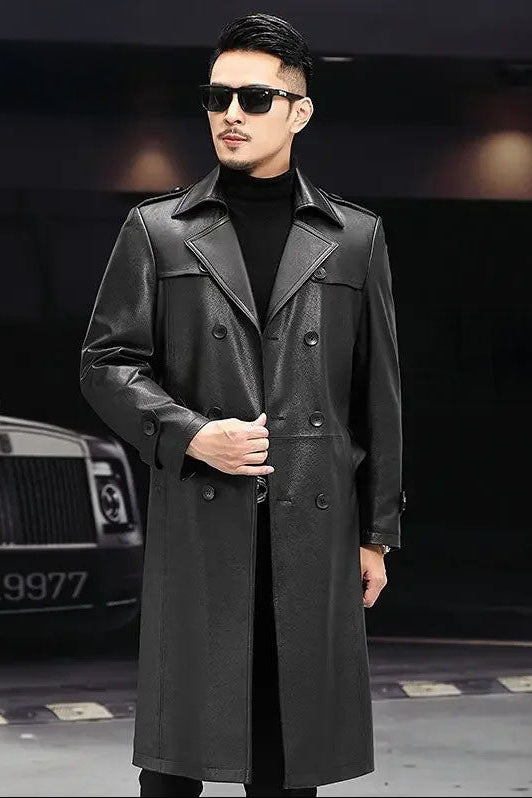 Men’s Onyx cowhide leather trench coat unfastened, model holding the front side — From Borcelleclothes.