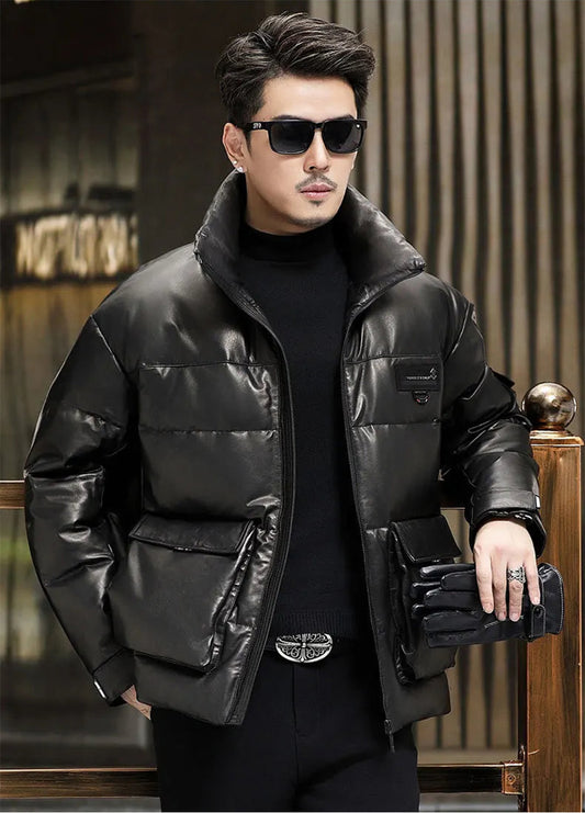 Model wearing Onyx cowhide jacket with oversized cargo pockets, leaning on a metal railing — From Borcelleclothes.