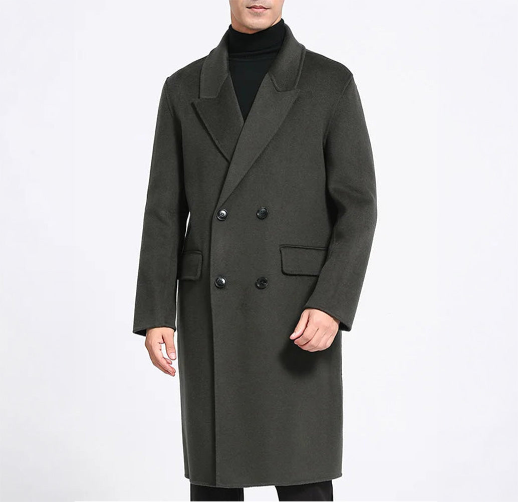 Men’s double-breasted wool coat with peaked lapels in Tautara—crafted for silence, weight, and enduring presence. From Borcelleclothes.