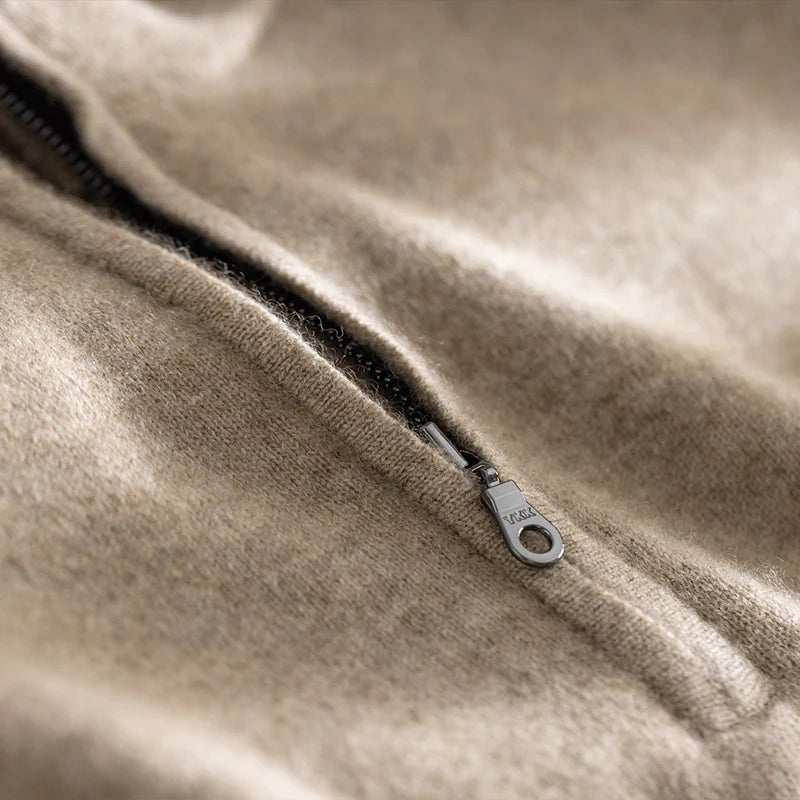 Unzipped mock neck detail of the Sandrift cashmere sweater, showcasing the smooth zipper puller and clean edge finishing — From Borcelleclothes.