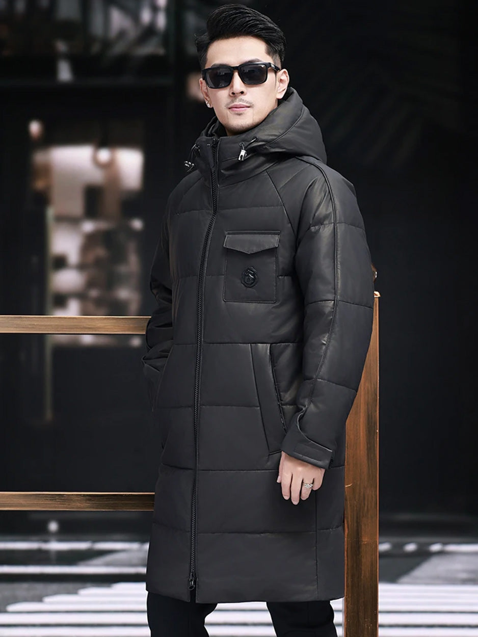 Model turned slightly to the side wearing the cowhide down coat with raglan sleeves — From Borcelleclothes.