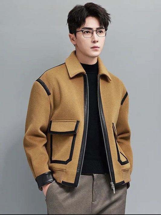 Wool-and-cashmere jacket in Lion with leather trims, model standing with hands in pants pockets — From Borcelleclothes.
