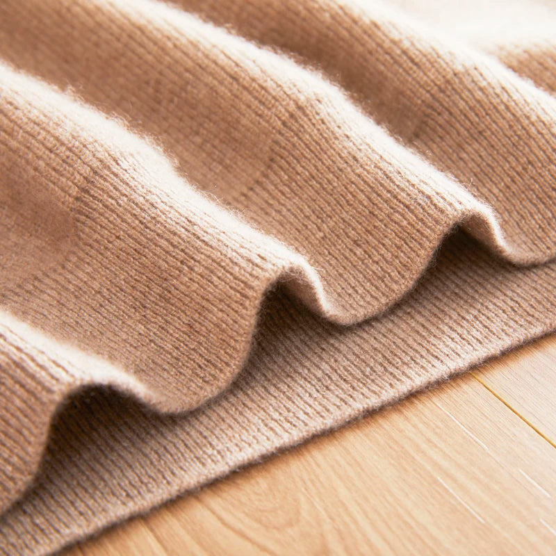 Bottom hem detail of the ribbed Himalayan cashmere sweater in French Beige — From Borcelleclothes.