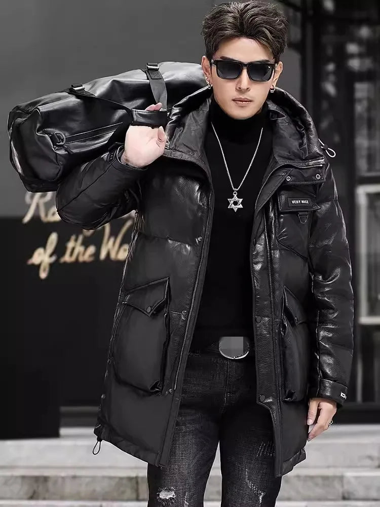 Model in Onyx gloss down jacket carrying oversized black bag over shoulder, highlighting streetwear energy and style. From Borcelleclothes.
