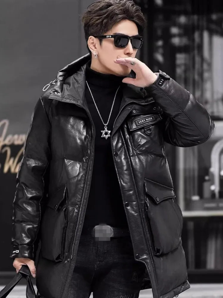 Model in Onyx gloss jacket with hand lightly touching lips — a stylized gesture blending confidence with a hint of self-awareness. From Borcelleclothes.