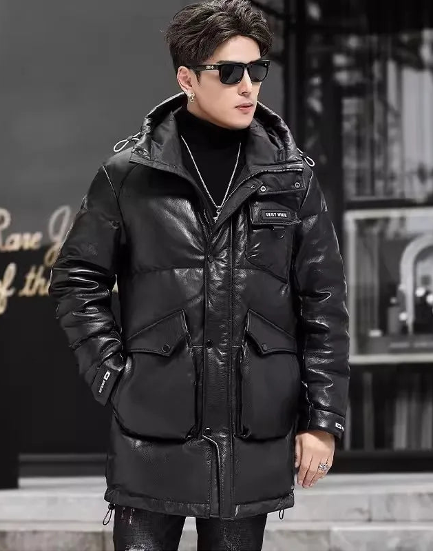 Men's sheepskin gloss down jacket in Onyx, mid-thigh length with curved placket, reflective surface, and soft silhouette. From Borcelleclothes.