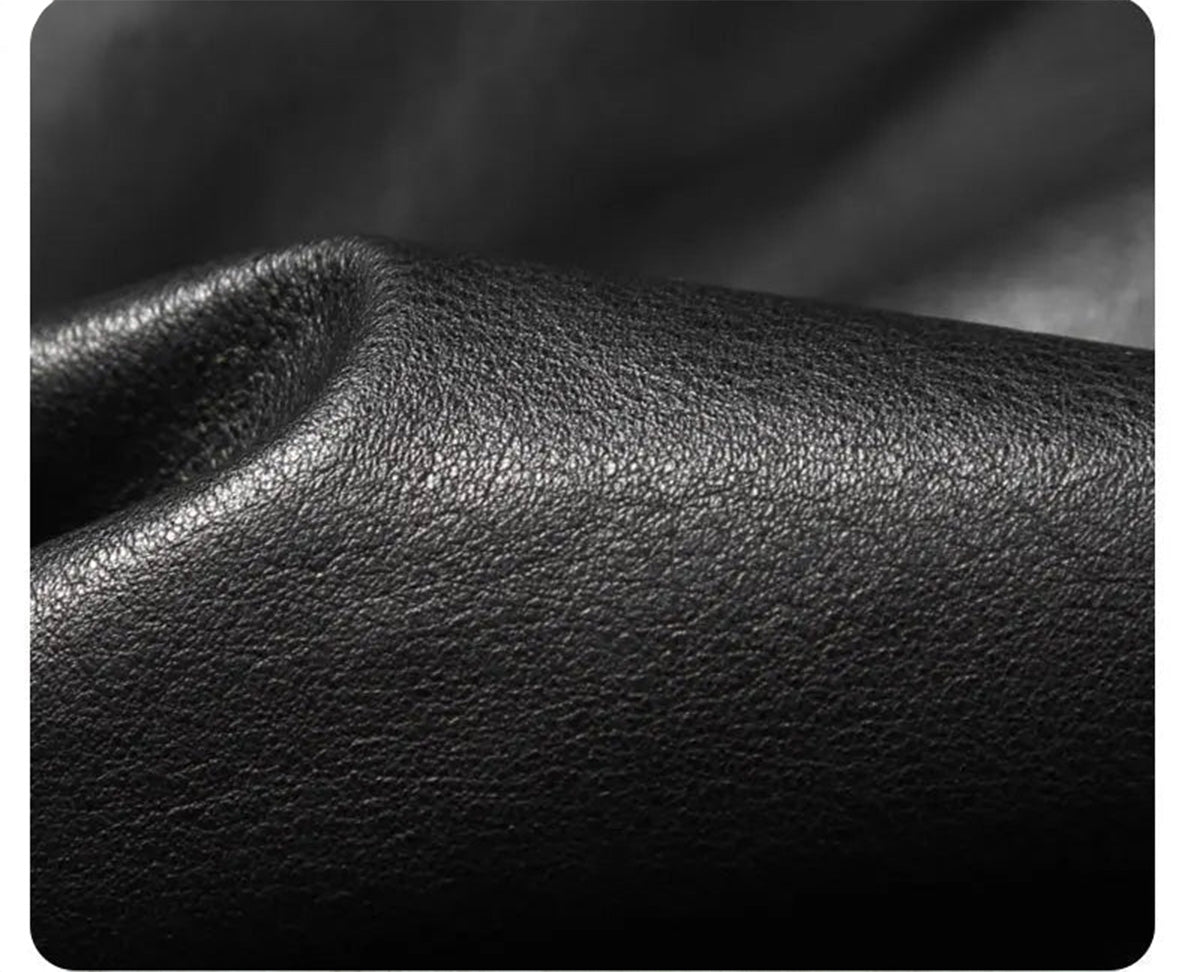 Close-up of the folded sheepskin surface revealing the soft natural wave of the leather texture — From Borcelleclothes.