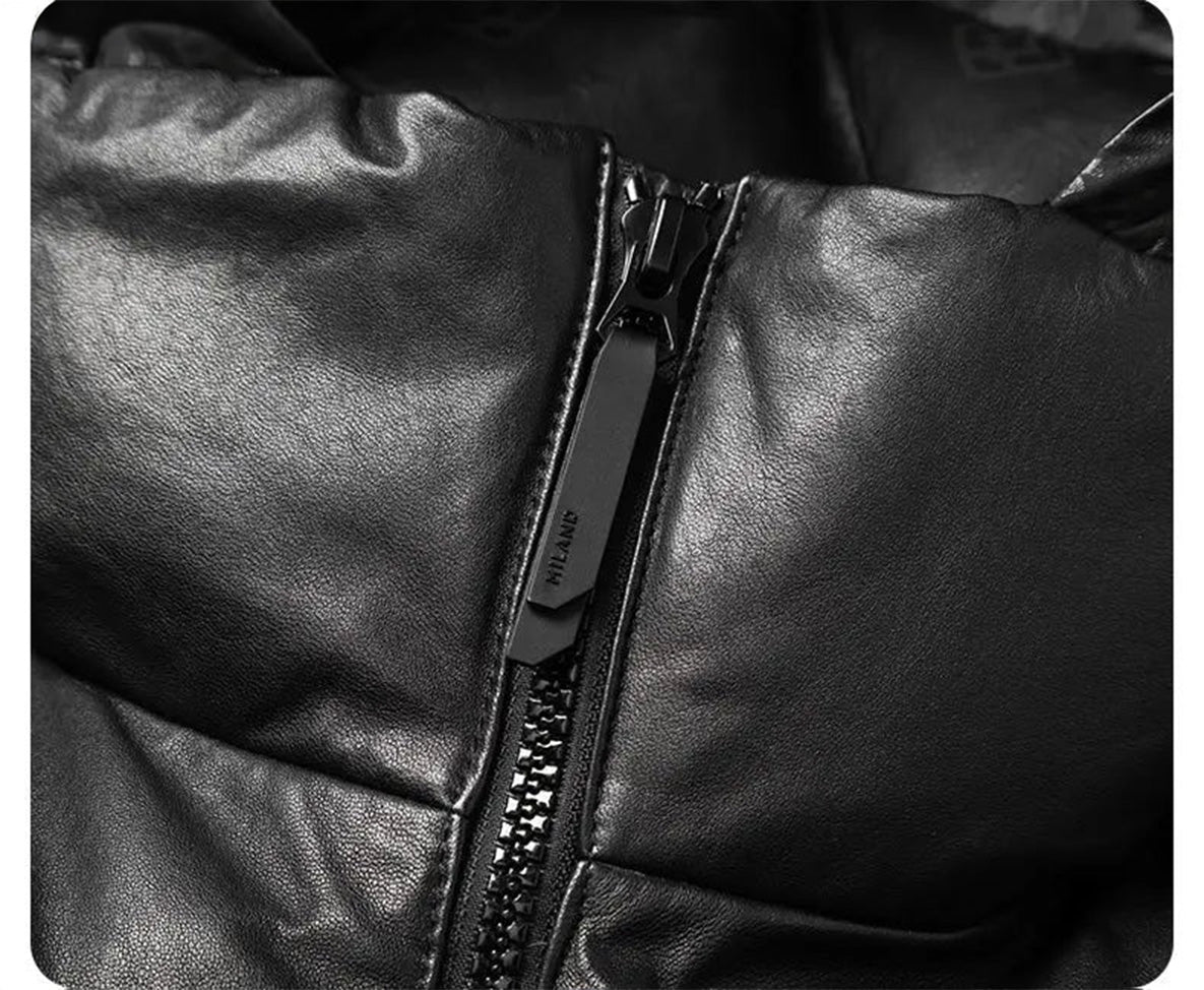 Detail of the zipped-up high stand collar in Onyx sheepskin, emphasizing clean vertical alignment — From Borcelleclothes.