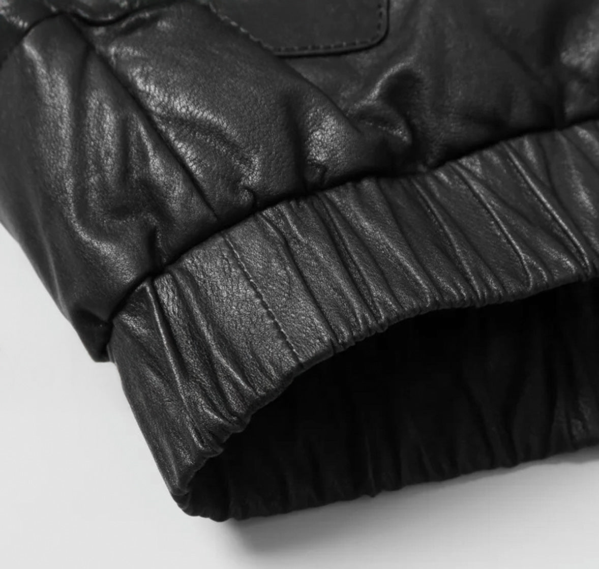 Black Magic sheepskin jacket with leather insert at bottom hem – From Borcelleclothes.