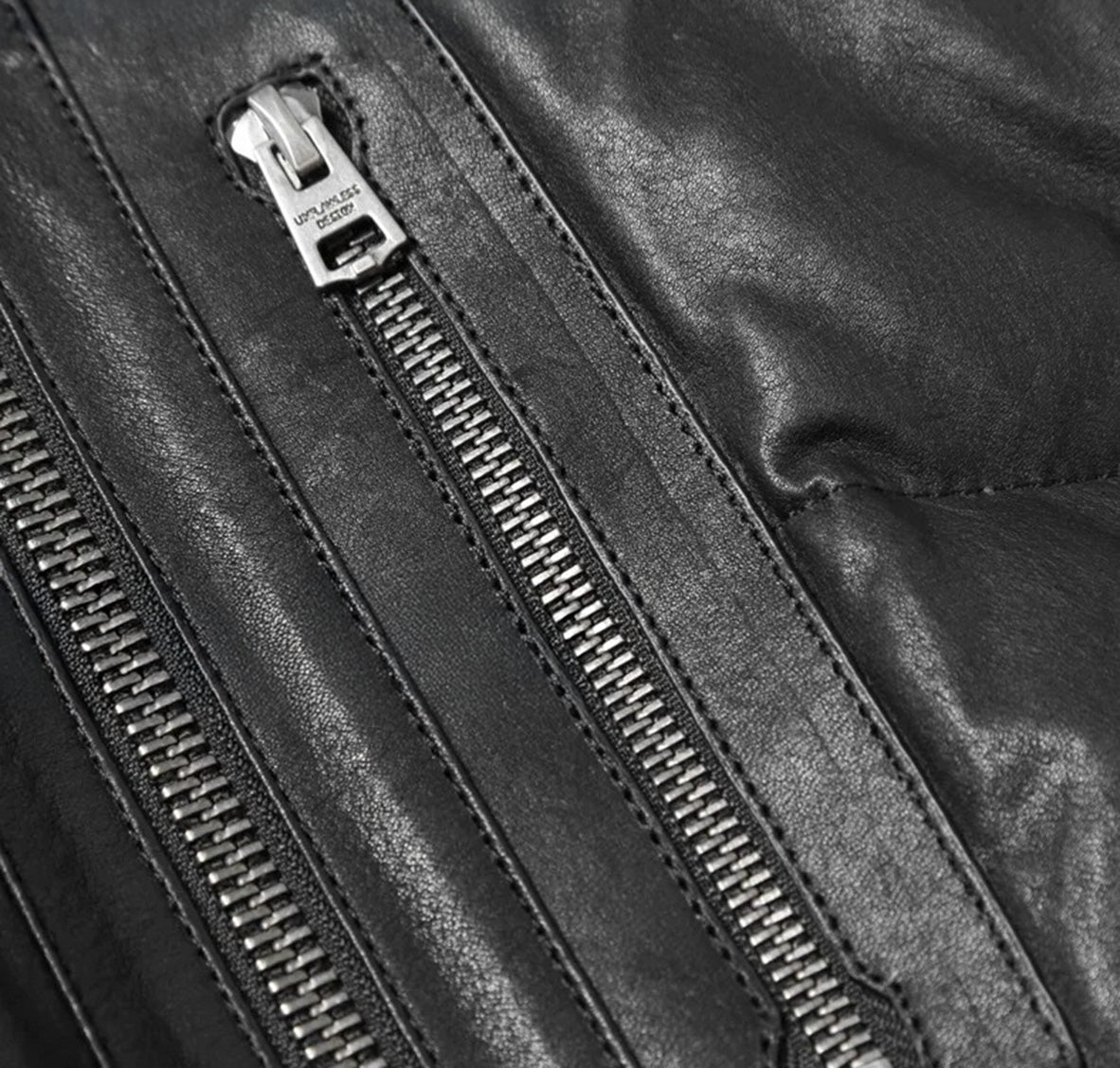 Zipped chest pocket detail on Black Magic sheepskin jacket – From Borcelleclothes.