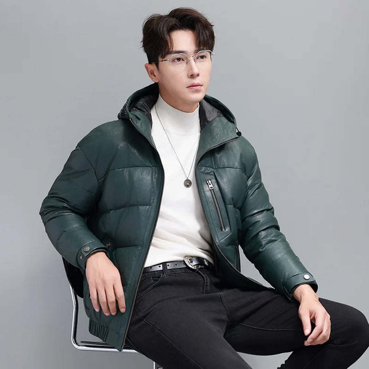 Model seated on a chair wearing Winter Balsam sheepskin jacket – From Borcelleclothes.