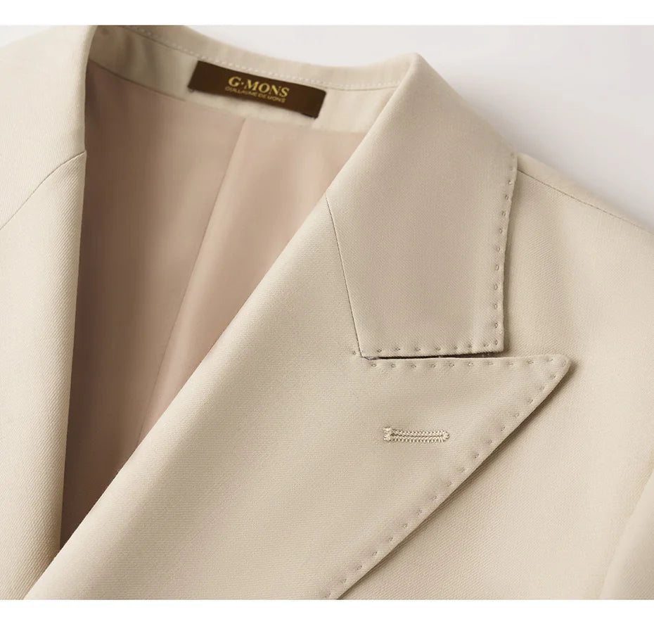 Close-up of the blazer’s left lapel in Soft Amber, featuring the horn button and hand-finished buttonhole. From Borcelleclothes.