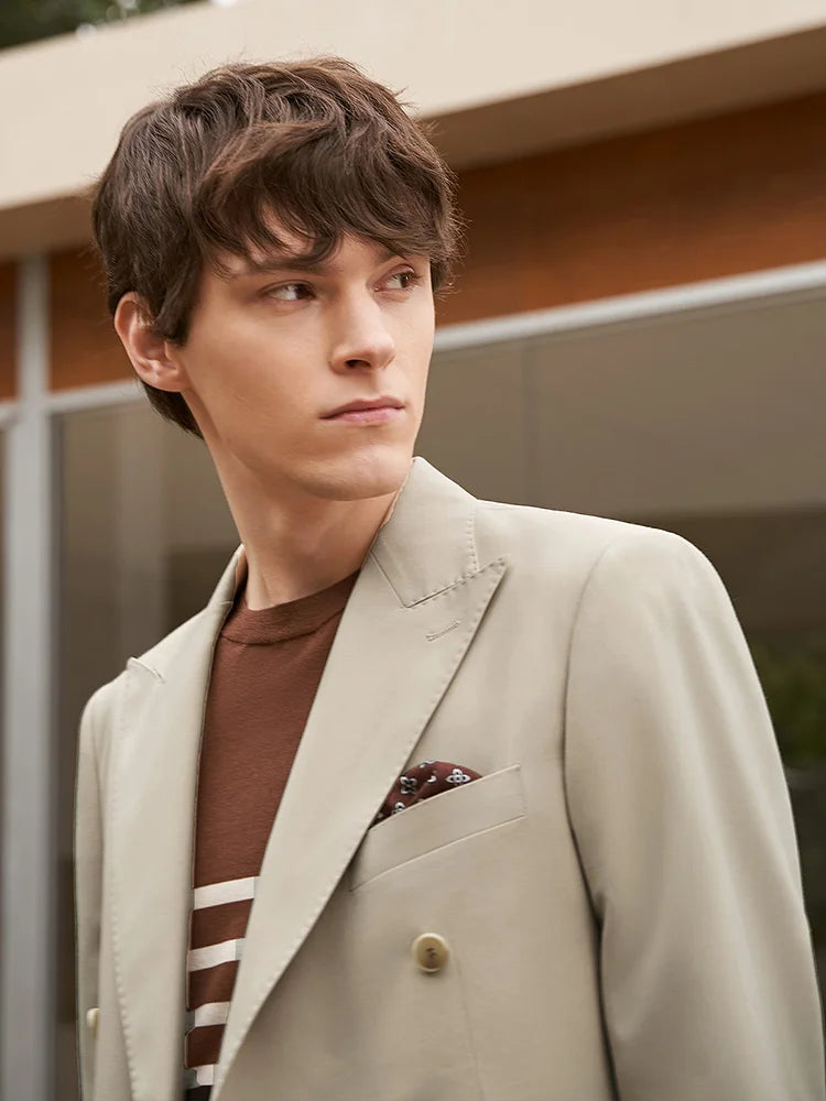 Upper part of the Soft Amber suit on model, highlighting the structured shoulders and refined tailoring. From Borcelleclothes.