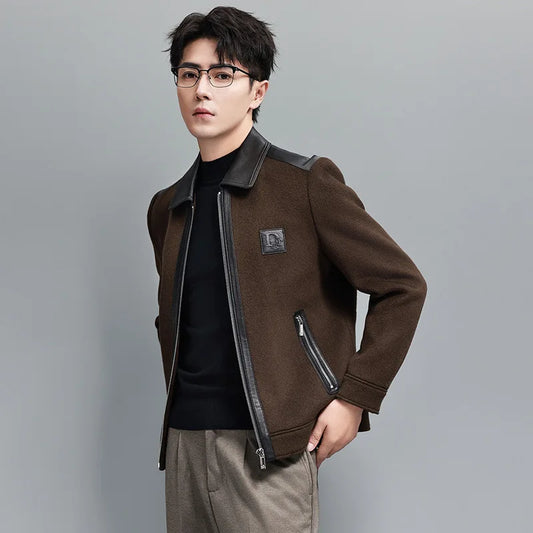 Men’s structured leather-wool jacket in Dark Rum, featuring a leather collar, shoulders, and back with soft wool panels, finished with cuffs and a lower band for a defined silhouette. From Borcelleclothes.