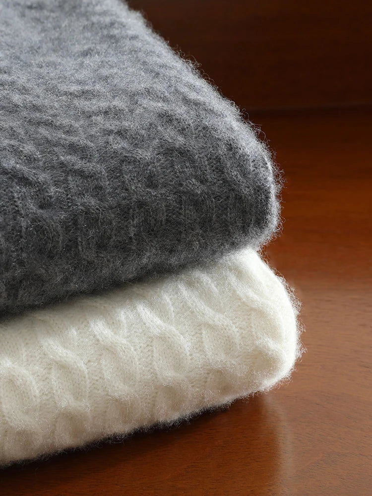 Stacked display of the Alashan cashmere V-neck sweaters in Davy Grey and Platinum — From Borcelleclothes.