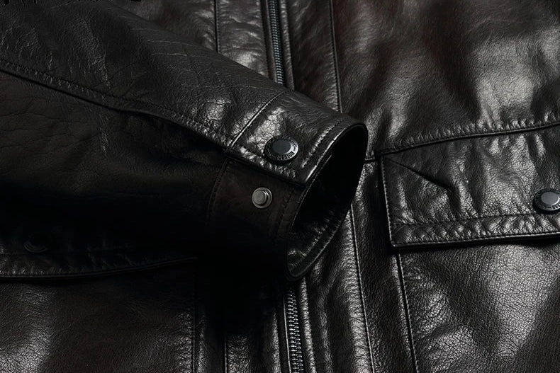 Snap cuff with sleeve opening — set-in long sleeve detail on the Men's Wenge Leather Down Jacket — From Borcelleclothes.