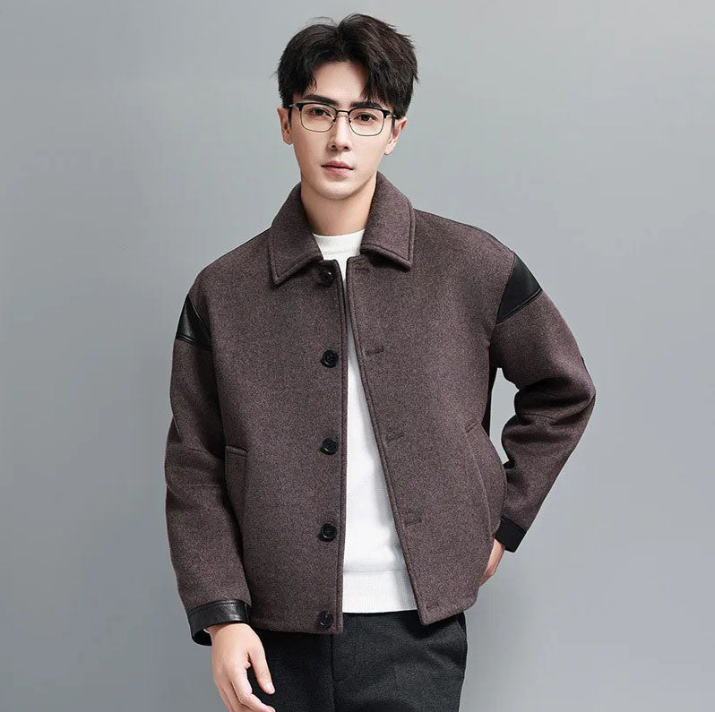 Model with hand behind back wearing men's wool-cashmere jacket with leather traces – From Borcelleclothes.