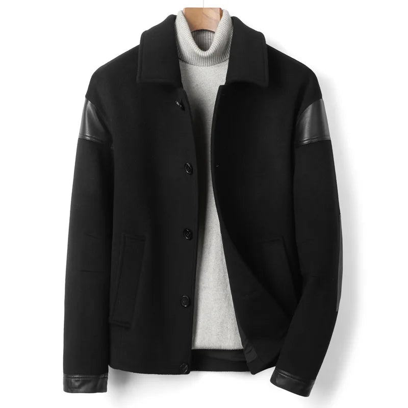Men's wool-cashmere jacket in Onyx, with leather traces, combining soft tailoring with refined leather accents for a look between charm and shadow. From Borcelleclothes.