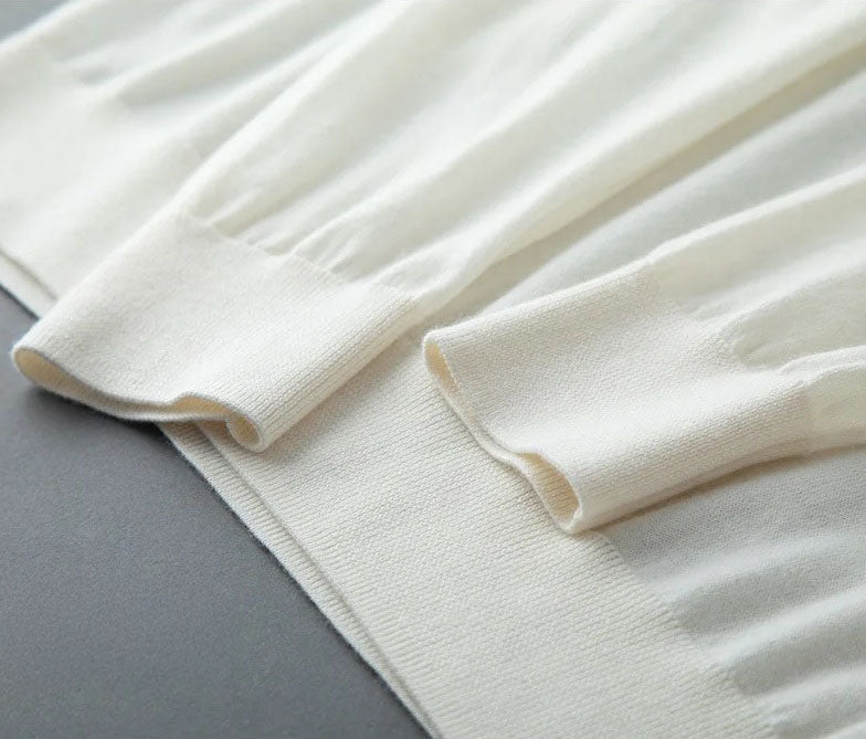 Close-up of the slim 1×1 ribbed cuffs on the Platinum worsted cashmere crewneck sweater — From Borcelleclothes.