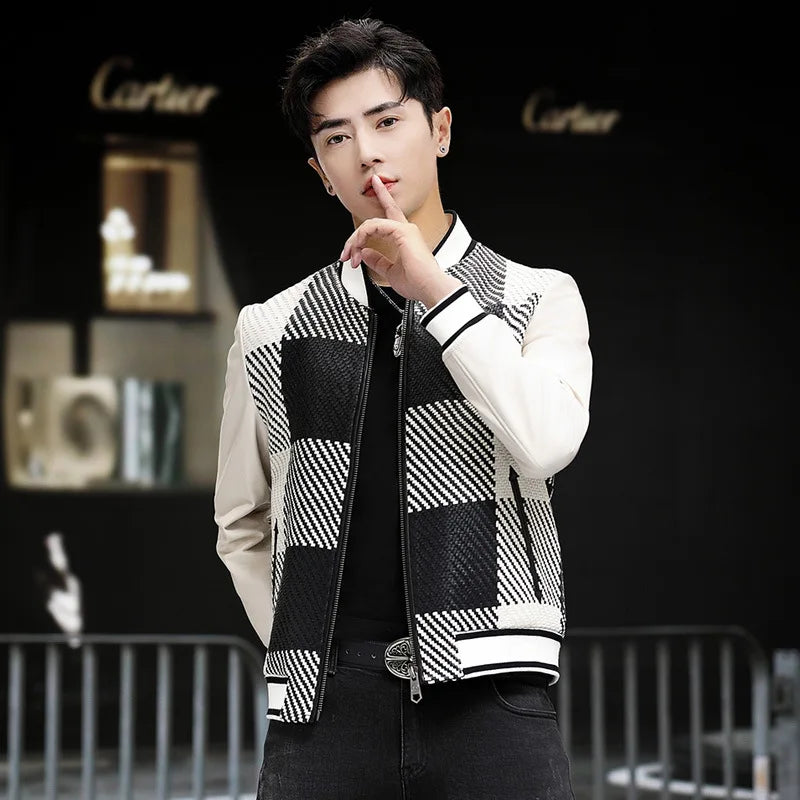 Model making “silence” gesture (finger to lips); woven-leather plaid jacket (Platinum & Onyx) — From Borcelleclothes.