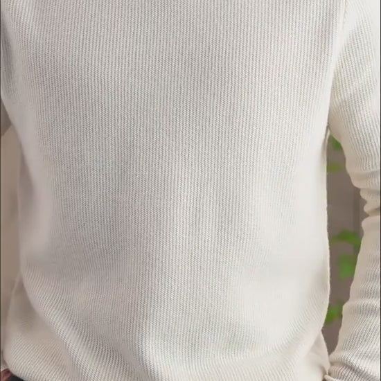 Video showcasing a Men's Grade A Alashan cashmere turtleneck sweater in Pearl Bush and Sandal colors. From Borcelleclothes.