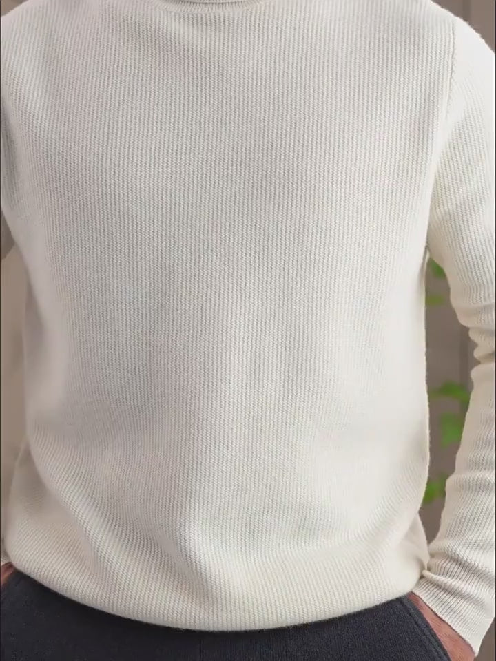 Video showcasing a Men's Grade A Alashan cashmere turtleneck sweater in Pearl Bush and Sandal colors. From Borcelleclothes.