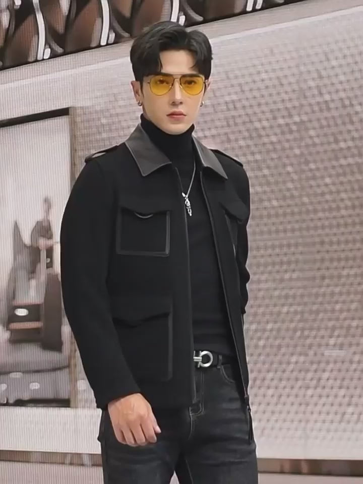 Video showcasing a Men’s leather-accented mini-coat in Onyx, with refined tailoring, genuine leather collar and trims, blending classic form with modern sophistication. From Borcelleclothes.