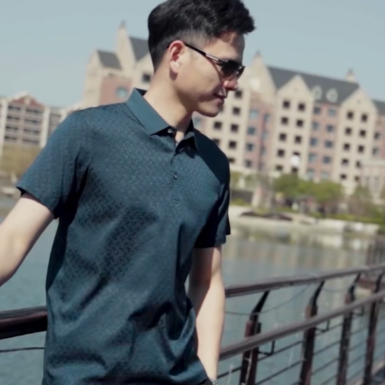 Video showcasing a Men’s Mulberry silk polo in Gulf Blue and Sea Fog colors, with raised diamond jacquard — composed, breathable, and structured for the space between formality and ease. From Borcelleclothes.