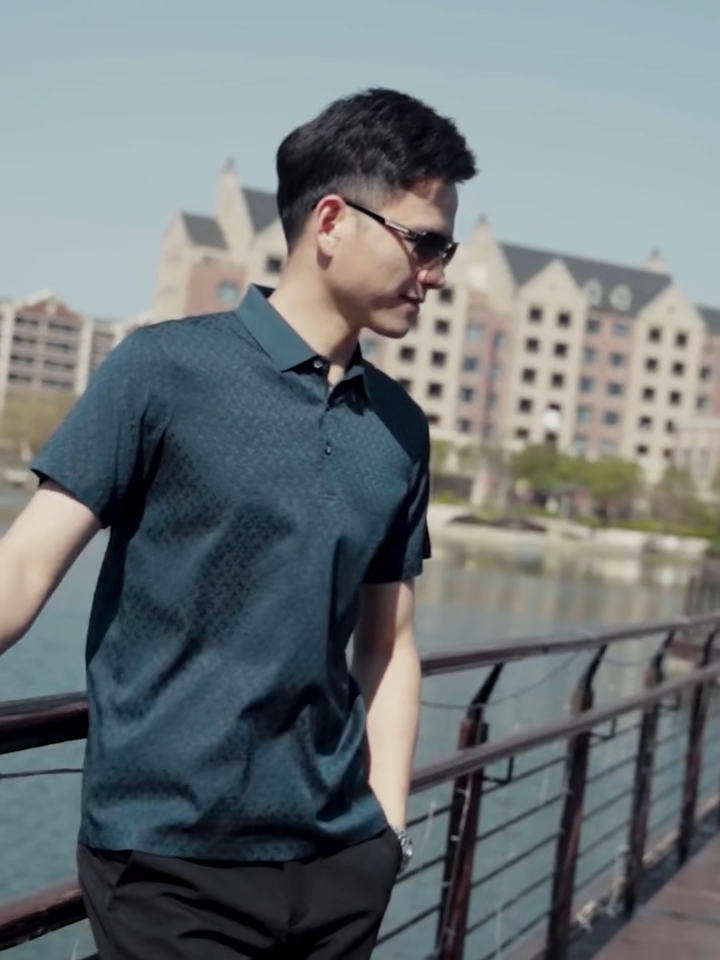 Video showcasing a Men’s Mulberry silk polo in Gulf Blue and Sea Fog colors, with raised diamond jacquard — composed, breathable, and structured for the space between formality and ease. From Borcelleclothes.