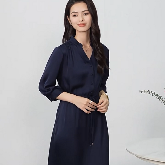 Video showcasing a double georgette silk dress in Monticola Solitarius and Behind the Clods colors, with a curved high-low hem, stand-up collar, and drawstring waist creating fluid drapes. — From Borcelleclothes.