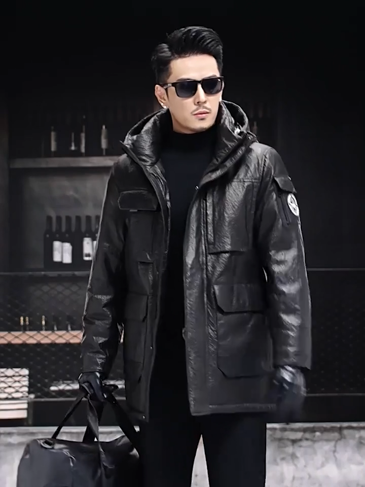 Video showcasing a Men’s structured cowhide leather jacket in Onyx, featuring compressed surface texture, patch pockets, and concealed fastenings — From Borcelleclothes.