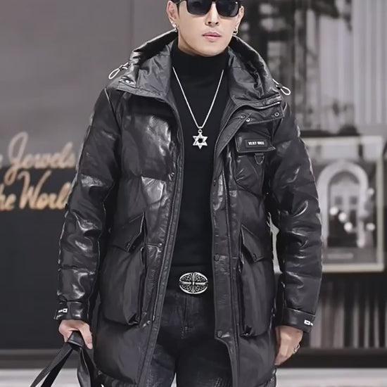 Video showcasing a Men's sheepskin gloss down jacket in Onyx, mid-thigh length with curved placket, reflective surface, and soft silhouette. From Borcelleclothes.