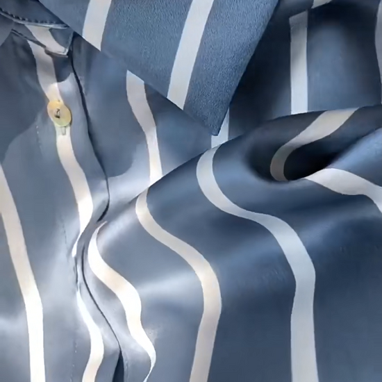 Video showcasing a Women's Luxury 6A Mulberry Silk Shirt in Beautiful Song and He Loves Me hues – Premium 100% Mulberry Silk with a Relaxed, Pajama-Inspired Silhouette for Effortless Elegance. From Borcelleclothes.