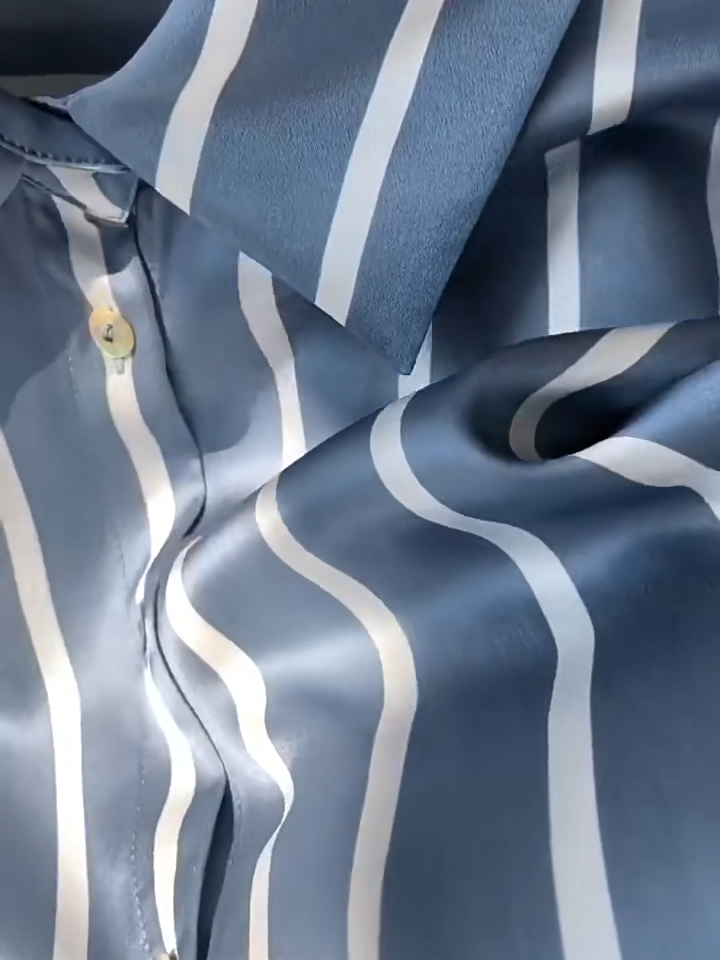 Video showcasing a Women's Luxury 6A Mulberry Silk Shirt in Beautiful Song and He Loves Me hues – Premium 100% Mulberry Silk with a Relaxed, Pajama-Inspired Silhouette for Effortless Elegance. From Borcelleclothes.
