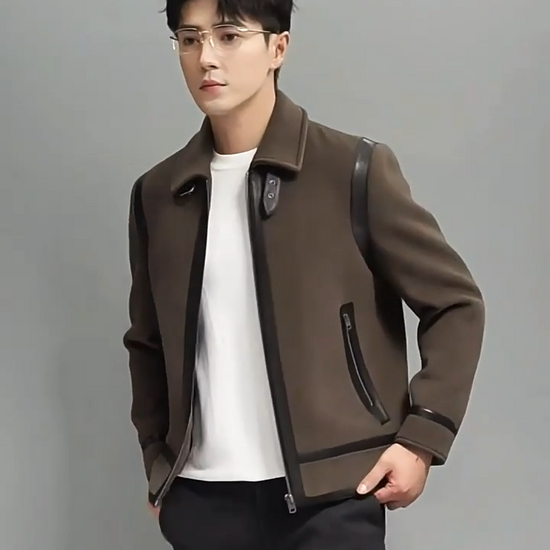Video showcasing a Men's Luxury wool-cashmere bomber jacket with sheepskin leather trim in Makara, featuring vertical back leather stripes, leather-framed zipper, and collar strap with metal buckle – from Borcelleclothes.