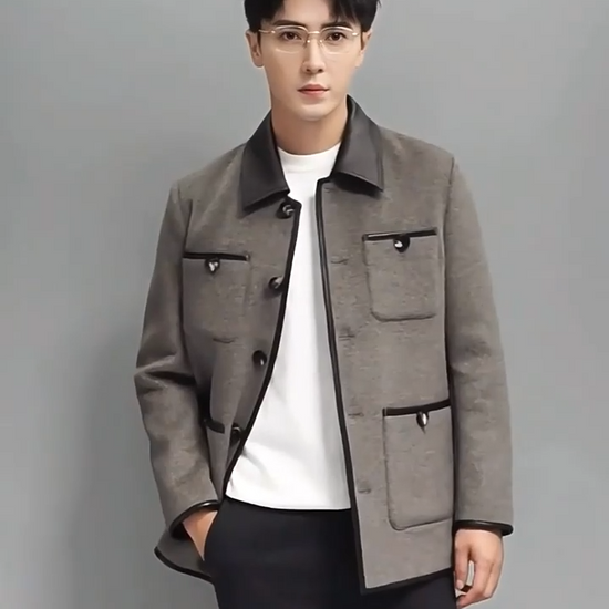 Video showcasing a Men’s minimalist motif wool-cashmere coat in Dawn, with leather collar, horn buttons, and four symmetrically placed pockets — from Borcelleclothes.