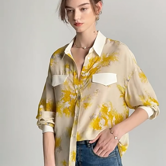 Video showcasing a women's 100% Mulberry Silk Mimosa Print Shirt. From Borcelleclothes.
