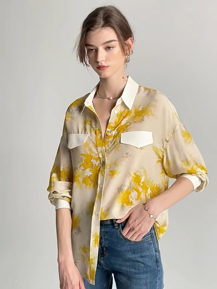 Video showcasing a women's 100% Mulberry Silk Mimosa Print Shirt. From Borcelleclothes.