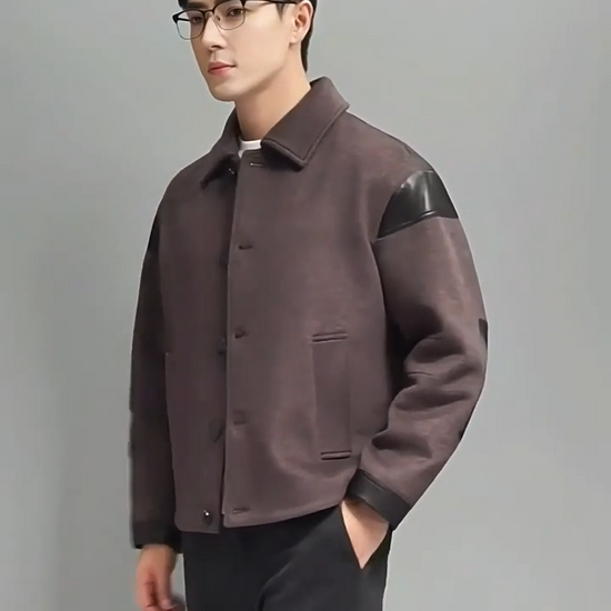 Video showcasing a Men's wool-cashmere jacket in Don Juan, with leather traces, combining soft tailoring with refined leather accents for a look between charm and shadow. From Borcelleclothes.