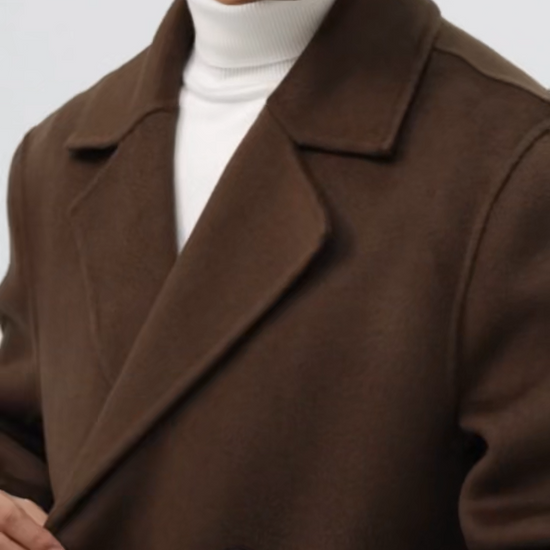 Video showcasing a Men’s double-faced wool coat in Espresso with notch lapels, double-breasted front, and hand-finished seams—crafted for quiet strength and lasting warmth. From Borcelleclothes.