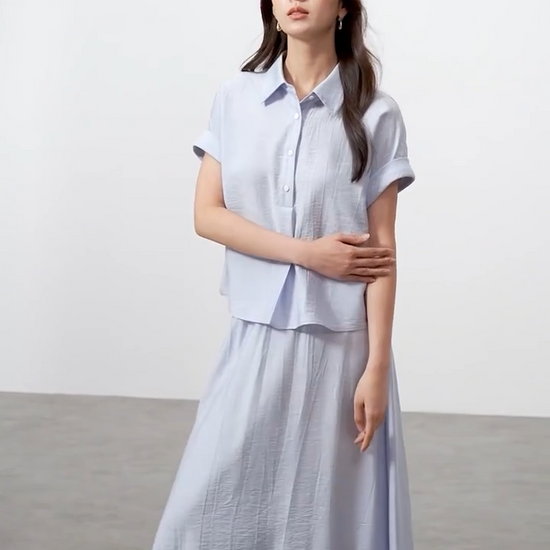 Video showcasing a Women's Two-piece kimono set in Forget-me-not Mist color, crinkled viscose, oversized shirt, and flared midi skirt. — From Borcelleclothes.